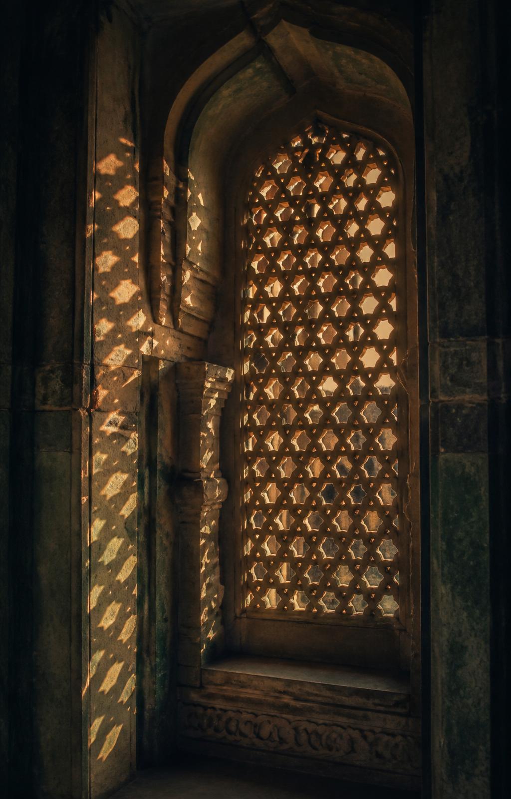The Charminar jali — stone lattice of the monument, catching the light